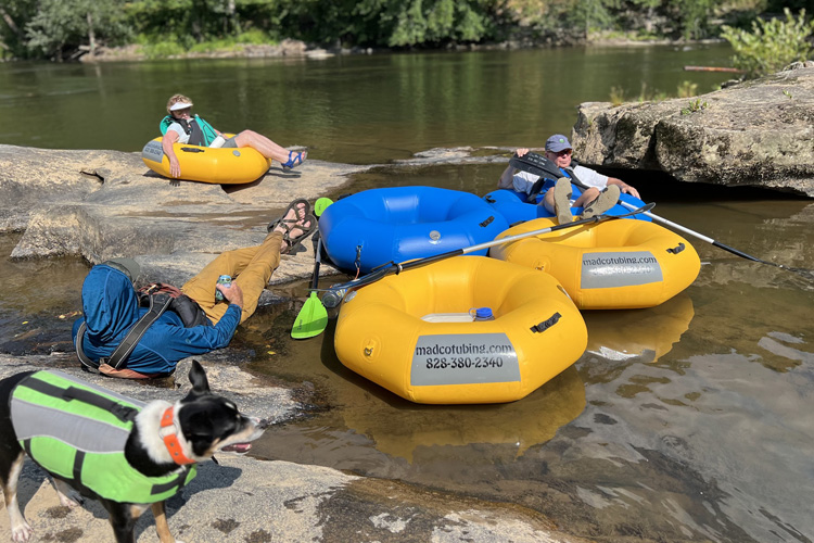 Finally Friday Float adults enjoying evening tubing on French Broad River